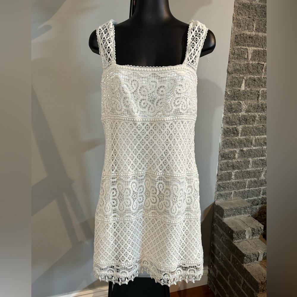 Beautiful white laced dress. Perfect for the holidays or a cruise